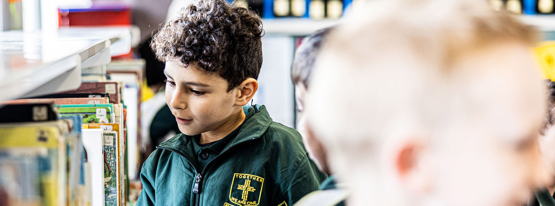 WE ENCOURAGE CURIOSITY AND INSPIRE A LOVE OF LEARNING