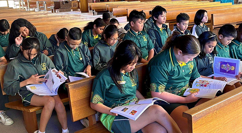 Students from St Aidan's Catholic Primary School Rooty Hill at local church