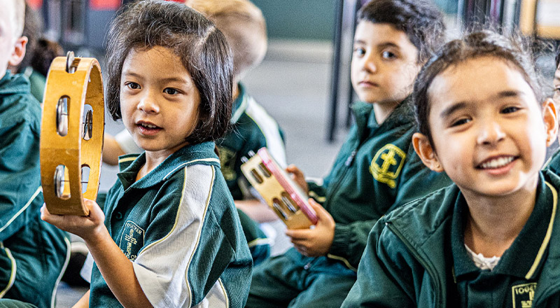 Students playing percussion instruments at St Aidan's Catholic Primary School Rooty Hill