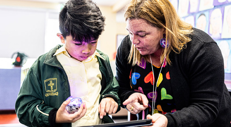 Dedicated teacher and student from St Aidan's Catholic Primary School Rooty Hill