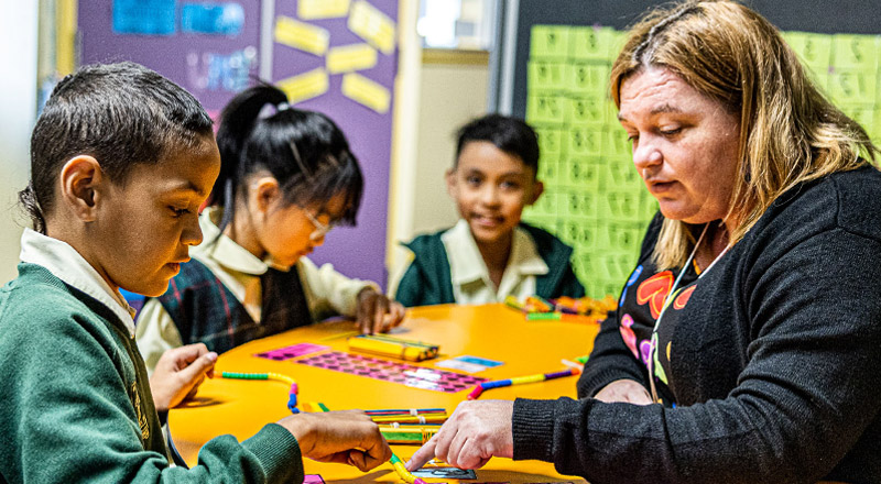 Dedicated teacher and student from St Aidan's Catholic Primary School Rooty Hill