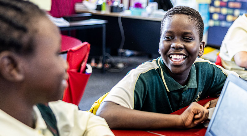 Smiling student from St Aidan's Catholic Primary School Rooty Hill
