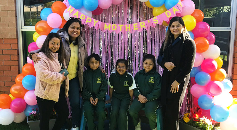Mothers and children taking photos at St Aidan's Catholic Primary School Rooty Hill