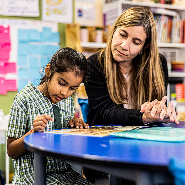 Dedicated teacher and student from St Aidan's Catholic Primary School Rooty Hill