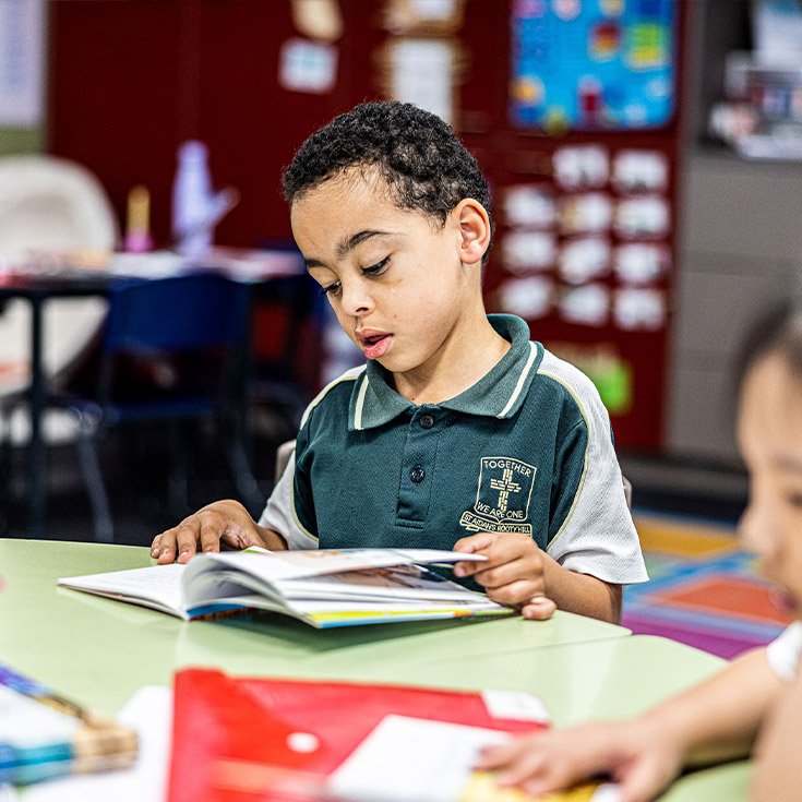 Student reading at St Aidan's Catholic Primary School Rooty Hill