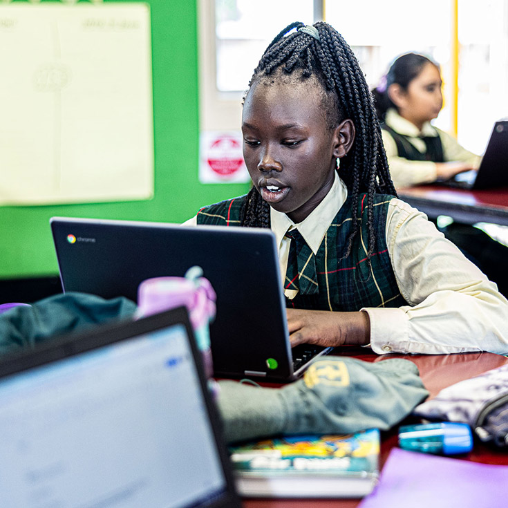 Student on laptop at St Aidan's Catholic Primary School Rooty Hill