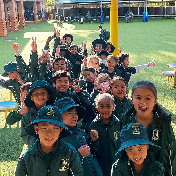 Cheering students from St Aidan's Catholic Primary School Rooty Hill